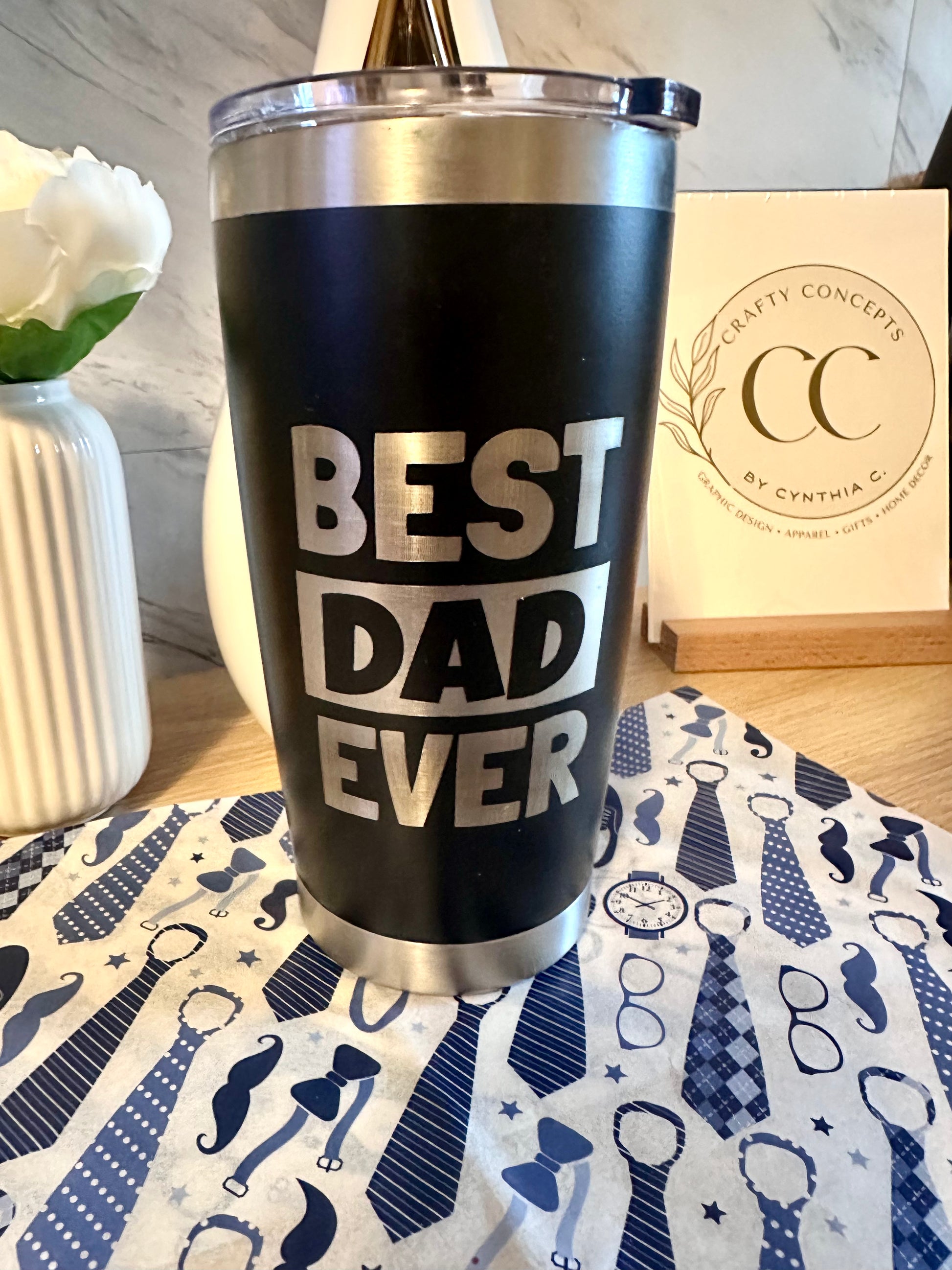 Black stainless steel “Best Dad Ever” tumbler paired with a personalized laser engraved leather keychain displayed as a Father’s Day gift set.