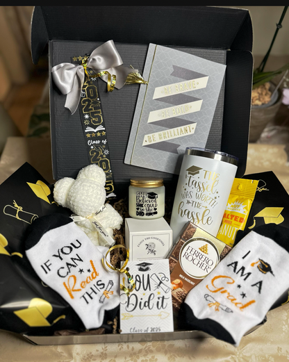  Black and gold graduation gift box with engraved Tassel Was Worth the Hassle tumbler, scented candle, grad socks, towel bear, journal and treats