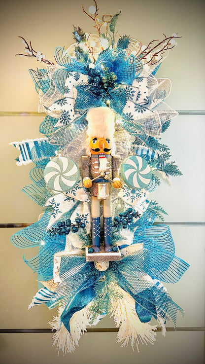 Ice blue and silver Christmas Nutcracker front door wreath.