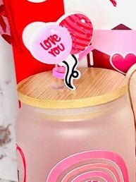 Glass tumbler with "Love you" straw topper.
