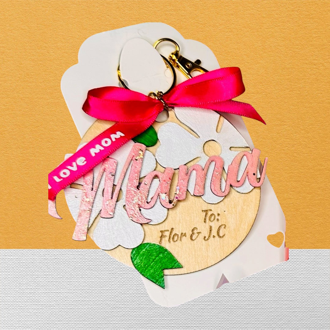 Wooden "Mama" floral gift tag with pink ribbon and Mother's Day heart balloon topper.