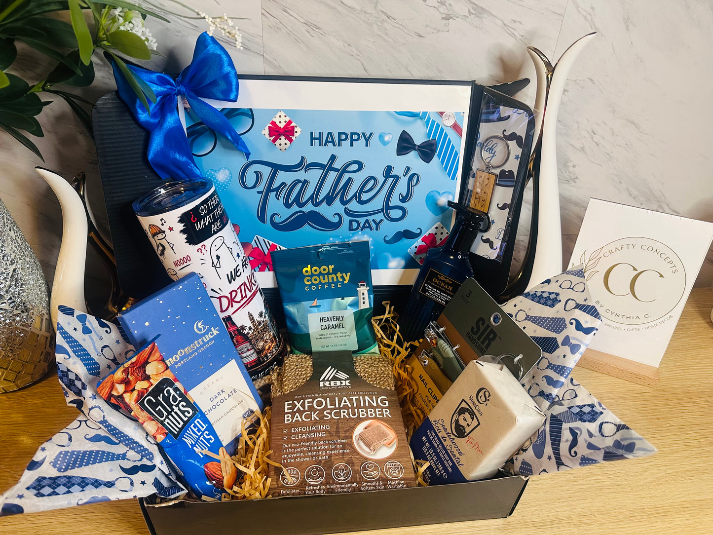 Signature Dad Box featuring personalized tumbler, gourmet coffee, snacks, men’s grooming essentials, and engraved wooden keychain option in luxury Father’s Day gift packaging