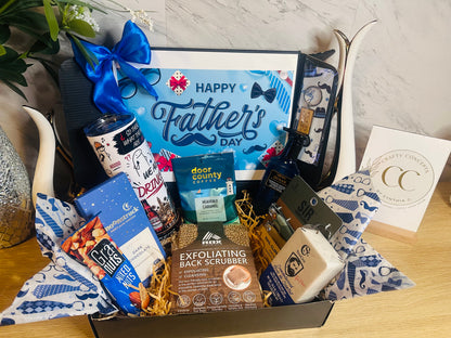 Signature Dad Box featuring personalized tumbler, gourmet coffee, snacks, men’s grooming essentials, and engraved wooden keychain option in luxury Father’s Day gift packaging