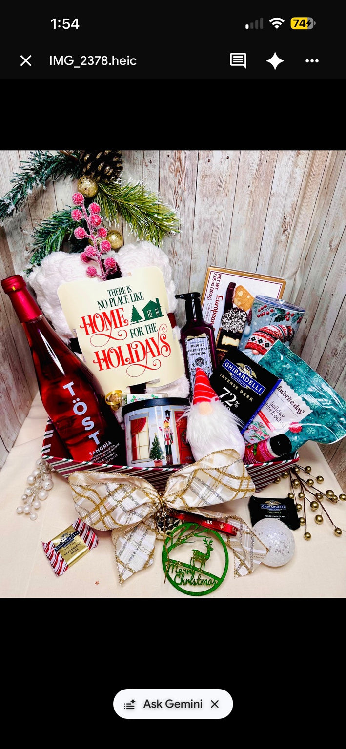Deluxe non-alcoholic Christmas gift basket with holiday drinkware and festive gifts